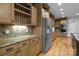 Bright kitchen with stainless steel appliances and custom wood cabinets, perfect for gatherings at 1770 Cranwell Dr, Mt Ulla, NC 28125