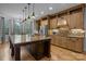 Gourmet kitchen boasts stone countertops, stainless steel appliances, and custom wood cabinets at 1770 Cranwell Dr, Mt Ulla, NC 28125