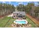 This home has a fenced backyard with an in-ground pool, a deck with plenty of room for entertaining, and a long driveway at 1770 Cranwell Dr, Mt Ulla, NC 28125