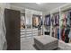 Organized walk-in closet with custom shelving, drawers, and ample hanging space at 1770 Cranwell Dr, Mt Ulla, NC 28125