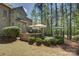 Outdoor patio with built-in grill, bar seating, and plenty of space at 17733 Colleton River Ln, Charlotte, NC 28278