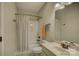 This bathroom features a shower with tub and a single sink at 17733 Colleton River Ln, Charlotte, NC 28278