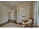 Neutral bedroom with a sitting area, walk-in closet and ample natural light at 17733 Colleton River Ln, Charlotte, NC 28278