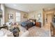 Cozy bedroom featuring a bed, couch, soft carpet, and windows providing natural light at 1801 Maryland Ave, Charlotte, NC 28209
