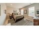 Inviting bedroom with a comfortable bed, stylish decor, and ample natural light at 1801 Maryland Ave, Charlotte, NC 28209