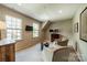 Cozy bonus room features a TV, comfortable seating and natural light at 1801 Maryland Ave, Charlotte, NC 28209