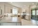 Bright, modern kitchen with white cabinetry, stainless steel appliances, and island at 1801 Maryland Ave, Charlotte, NC 28209