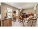 A comfortable living room offers natural light, neutral carpeting and a relaxing atmosphere at 1801 Maryland Ave, Charlotte, NC 28209