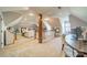 Expansive living room with natural light and a staircase at 1801 Maryland Ave, Charlotte, NC 28209