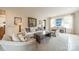 Bright living room with white walls, a fireplace, and comfortable furnishings at 1801 Maryland Ave, Charlotte, NC 28209