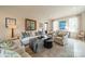 Bright living room with neutral colors, artful decor, and ample natural light at 1801 Maryland Ave, Charlotte, NC 28209