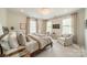 Serene main bedroom suite with natural light and sitting area at 1801 Maryland Ave, Charlotte, NC 28209