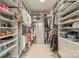 Spacious walk-in closet featuring custom shelving, drawers, and ample storage for clothes and accessories at 1801 Maryland Ave, Charlotte, NC 28209