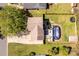 Aerial view of a home featuring a spacious backyard, a pool, deck, patio, and a trampoline, all fenced in at 1812 Rosewell Dr, Rock Hill, SC 29732