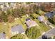 Aerial view of a suburban home with a fenced yard, an above ground pool and mature trees at 1812 Rosewell Dr, Rock Hill, SC 29732
