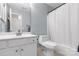 Full bathroom with white vanity, toilet, and shower/tub combination at 1812 Rosewell Dr, Rock Hill, SC 29732