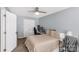 Bedroom with neutral walls, beige carpet, ceiling fan and double closet at 1812 Rosewell Dr, Rock Hill, SC 29732