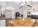 Well-lit kitchen area featuring a dining table and stainless steel appliances at 1812 Rosewell Dr, Rock Hill, SC 29732