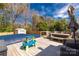 Deck area surrounding a covered pool and an outdoor living area with a table and seating at 1812 Rosewell Dr, Rock Hill, SC 29732