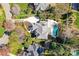 Bird's eye perspective of property showcasing the home's layout, landscaping, and pool area at 18512 Square Sail Rd, Cornelius, NC 28031