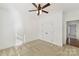 Clean room with neutral carpet, ceiling fan and double door closet at 18512 Square Sail Rd, Cornelius, NC 28031
