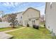 Well-maintained backyard with a patio and lush lawn at 18710 Coverdale Ct, Cornelius, NC 28031