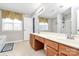 Bathroom with a dual vanity and shower-tub combination at 18710 Coverdale Ct, Cornelius, NC 28031