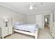 Inviting bedroom with a ceiling fan and large windows for natural light at 18710 Coverdale Ct, Cornelius, NC 28031
