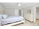 Comfortable bedroom with neutral walls and a dresser with mirror at 18710 Coverdale Ct, Cornelius, NC 28031
