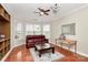 Bright and airy living room with hardwood floors and a bay window at 18710 Coverdale Ct, Cornelius, NC 28031