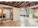 Unfinished basement with exposed ceiling, concrete floor, and visible utilities at 2144 Shadyview Dr, Charlotte, NC 28210