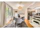 Bright dining area featuring hardwood floors, stylish furniture, and plenty of natural light at 2144 Shadyview Dr, Charlotte, NC 28210