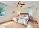 Relaxing main bedroom boasts hardwood floors, neutral walls, and two large windows at 2144 Shadyview Dr, Charlotte, NC 28210