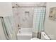 Bathroom with shower, tub and tile surround at 244 N Race St, Statesville, NC 28677