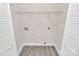 Spacious closet featuring wood-look floors, wire shelving, and bi-fold doors at 244 N Race St, Statesville, NC 28677