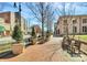 View of a street lined with benches, planters and trees at 244 N Race St, Statesville, NC 28677