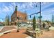 A view of the street with buildings, crosswalks and benches at 244 N Race St, Statesville, NC 28677