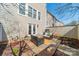 Outdoor patio area featuring seating, plants, and privacy fence at 2953 Craftsman Ln, Charlotte, NC 28204
