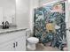 Bathroom featuring a vanity with stone countertop, toilet and playful dinosaur shower curtain at 3008 Quinebaug Rd, Fort Mill, SC 29715
