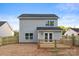 This backyard features a wooden deck, newly installed fence and ample space at 341 Bynum Ave, Rock Hill, SC 29732