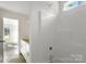 Clean bathroom featuring a new shower, and white cabinets. Ready for your personal touch at 341 Bynum Ave, Rock Hill, SC 29732
