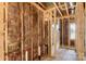 Unfinished bathroom with exposed studs, insulation, and piping showing construction progress at 341 Bynum Ave, Rock Hill, SC 29732