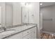 Bathroom featuring a double sink vanity with granite countertops and white cabinets at 341 Bynum Ave, Rock Hill, SC 29732