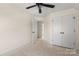 Bright bedroom with a ceiling fan, closet, and view to an adjoining room at 341 Bynum Ave, Rock Hill, SC 29732