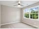 Neutral bedroom featuring a ceiling fan and a window with green views at 341 Bynum Ave, Rock Hill, SC 29732