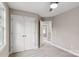 Bedroom featuring a ceiling fan, plush carpet, closet, and an adjoining room at 341 Bynum Ave, Rock Hill, SC 29732