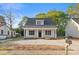 Charming single-story home with a gray roof and a well-manicured lawn at 341 Bynum Ave, Rock Hill, SC 29732