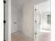 Bright hallway featuring white doors and view into an adjacent room at 341 Bynum Ave, Rock Hill, SC 29732