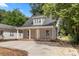 Charming two-story home with a concrete driveway, awaiting your personal touch at 341 Bynum Ave, Rock Hill, SC 29732