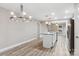 Bright, open kitchen with stainless steel appliances and an island with granite countertops at 341 Bynum Ave, Rock Hill, SC 29732